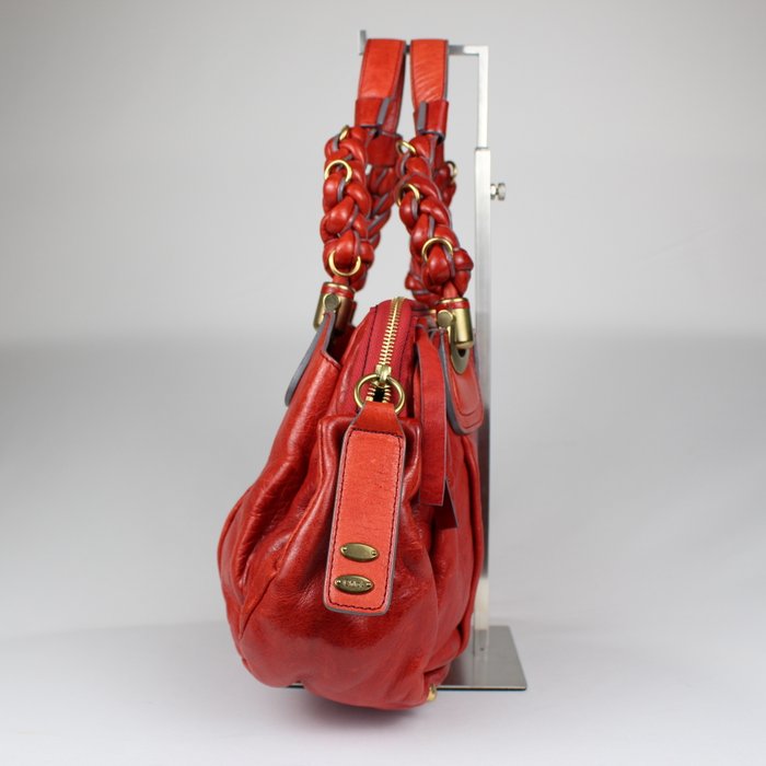 Chloé Heloise piel roja
