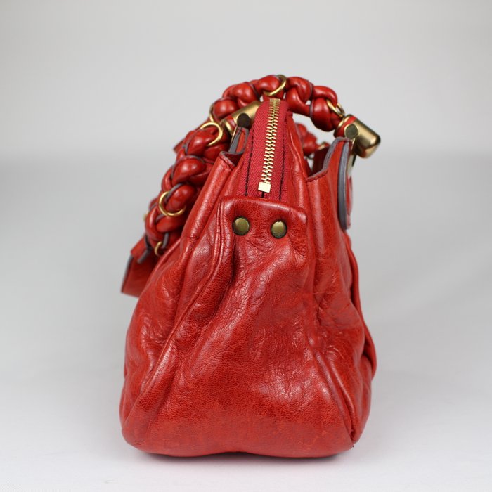 Chloé Heloise piel roja