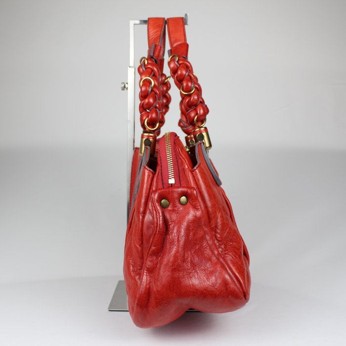 Chloé Heloise piel roja