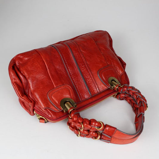 Chloé Heloise piel roja