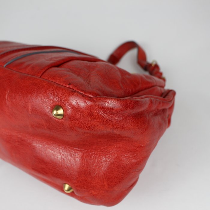 Chloé Heloise piel roja