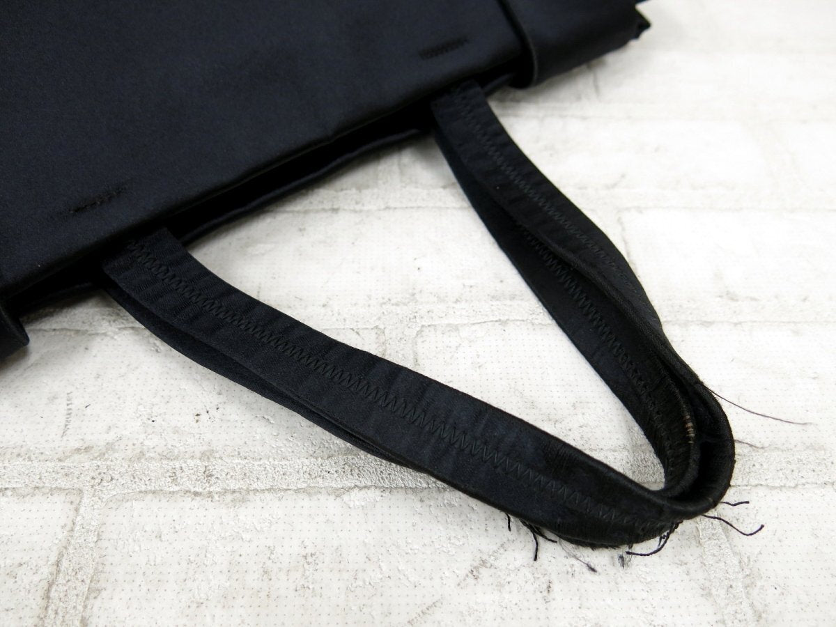 Prada – Bolso de mano vintage en satén negro