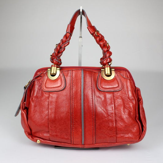 Chloé Heloise piel roja