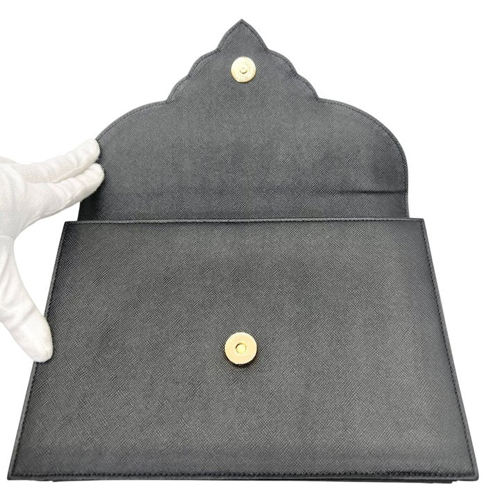 Yves Saint Laurent - Cartera de mano/clutch en cuero Saffiano